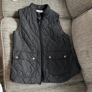 Black vest. Good condition.